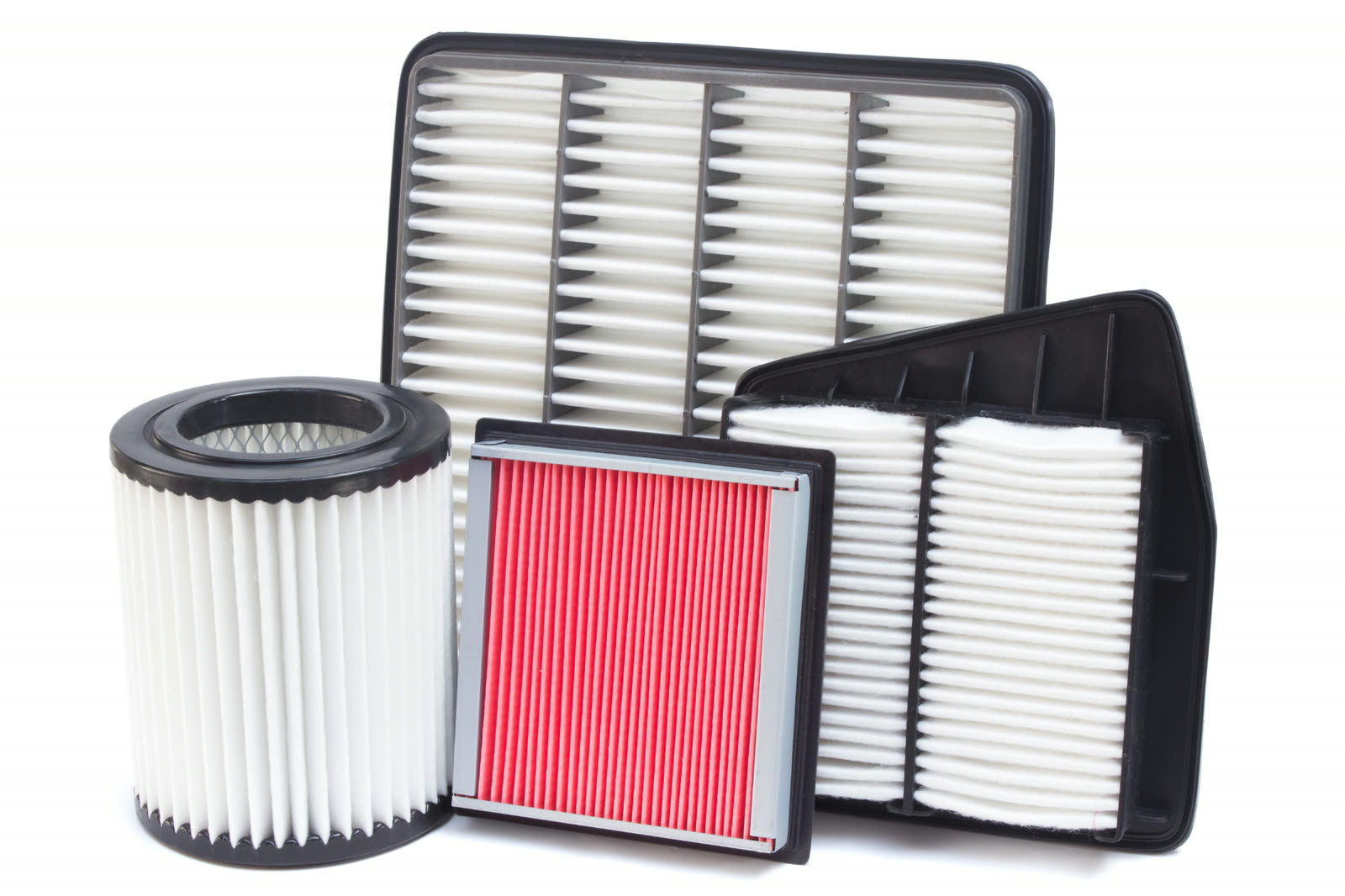 Technician inspecting a dirty engine air filter