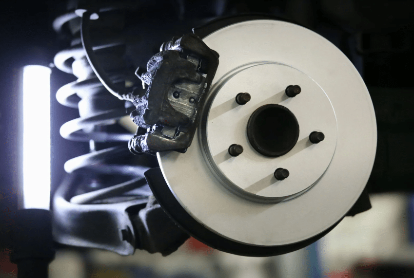 Blue Ridge Automotive | How Driving in a Stop-and-Go Traffic Affects Your Car Vehicle brake disc and caliper, designed for reliable performance in stop and go traffic.