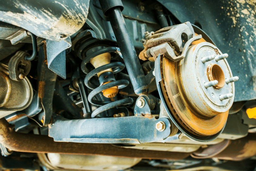Blue Ridge Automotive | Why a Suspension Check Matters: Protect Tire Life and Vehicle Safety Undercarriage showing spring and shock components inspected during a suspension check.